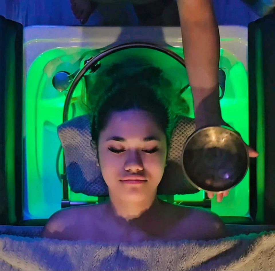 A head spa session with a sound bowl at Amm Beauty